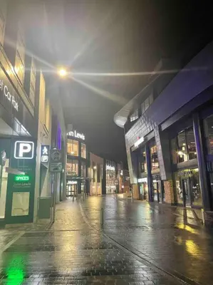 an empty street in a city at night at Bond Street Luxury Apartment Central Chelmsford in Chelmsford