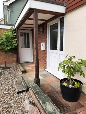 a front door of a house with a potted plant at Mildenhall Suffolk in Mildenhall