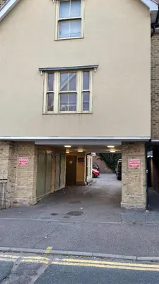 an empty parking lot in a building with a garage at 2 Bedroom Flat Ground Floor Town Centre Colchester in Colchester
