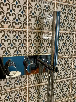 a bathroom with a mirror and a sink at The BeeKeepers - Homely Luxurious Self Catering in Diss
