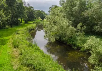an aerial view of a river from a bridge at 1 Bed in Quidenham oc-2233 in Quidenham