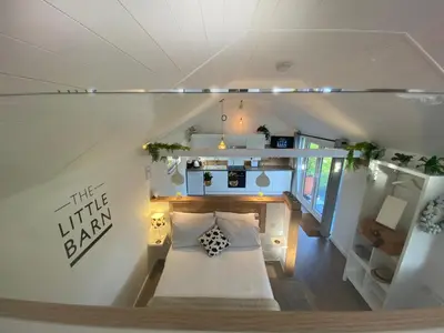 an overhead view of a bedroom in a tiny house at The Little Barn in Hoxne
