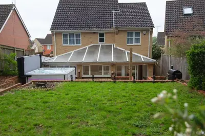 a house with a swimming pool in a yard at The Forest House in Brandon
