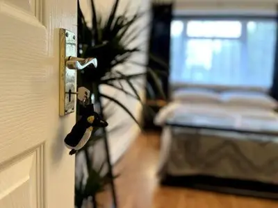 a door knob with a person on it in a room at Fourwinds in Maldon