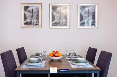 a dining room table with a bowl of fruit on it at Centrally Located 3 Bedroom House By Trinity Stays Short Lets & Serviced Accommodation Cambridge in Cambridge