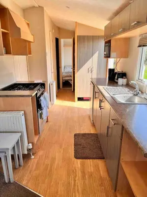 a kitchen with a sink and a counter top at Lola’s Caravan. Your home away from home. in Parkeston