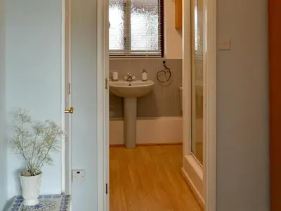 a bathroom with a sink and a sink at The Mount in Boxford