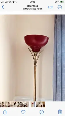 a red floor lamp in a living room at Ac lounge36 Room B in Rochford