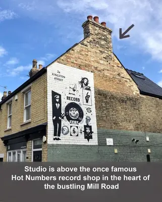 a sign on the side of a brick building at City Studio - very best Location For exploring Cambridge - walk to station and City Centre in Cambridge