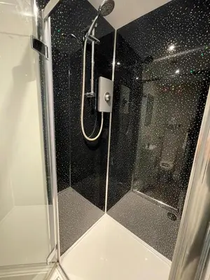 a shower with a glass door in a bathroom at Luxury City CB1 Studio Just Off Mill Rd - Walk to Station and City Centre in Cambridge