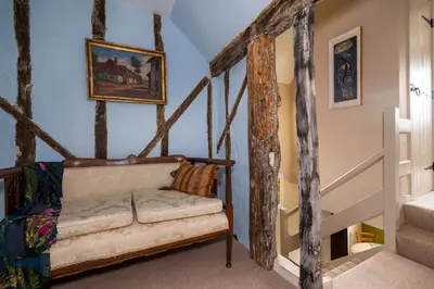 a room with stairs and a bench in a room at Pats Place in Sudbury