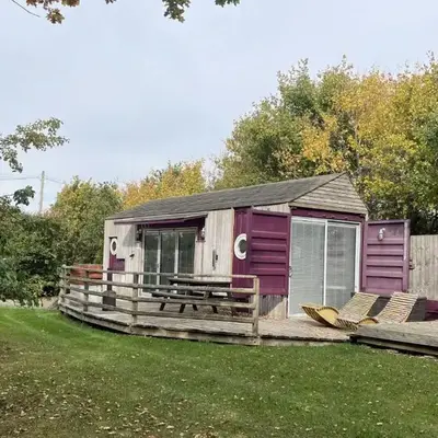 Purple CargoPod at Lee Wick Farm Cottages & Glamping