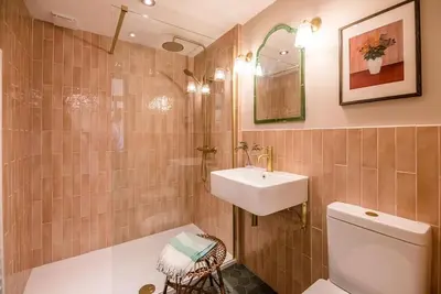 a bathroom with a sink and a toilet at The Studio, Hoo in Woodbridge