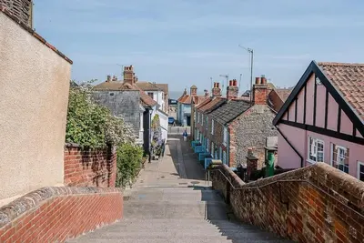a narrow street in a town with buildings at Lyndhurst, Aldeburgh in Aldeburgh