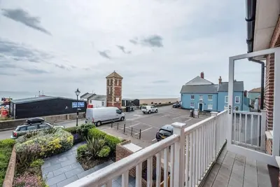 a balcony with a view of a parking lot at Swn-y-Don, Aldeburgh in Aldeburgh