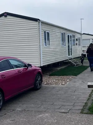 a car parked in front of a mobile home at Rohannah Luxe Coastal Escape, Cooper Beach East Mersea in East Mersea