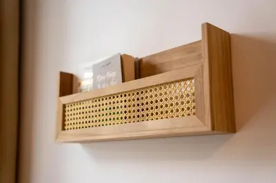 a wooden shelf hanging on a wall at Boho Style - KING BED, Central, Super FAST Wi-Fi in Cambridge