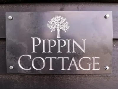 a sign that says ripin coffee on a wall at Pippin Cottage in Clacton-on-Sea