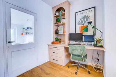 a home office with a desk and a computer at Cosy house on the seafront - Pass the Keys in Southend-on-Sea