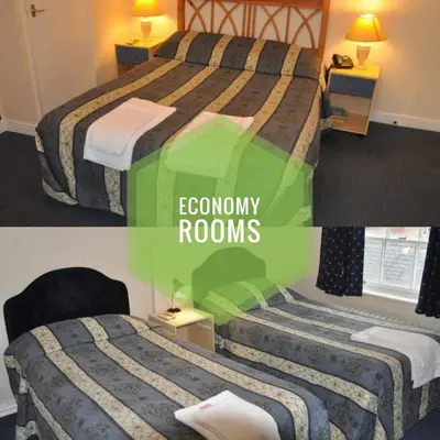 two pictures of a hotel room with two beds at The Carlton Hotel in Ipswich