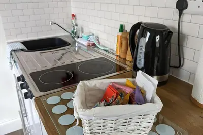 a basket sitting on a counter in a kitchen at Oak Tree View - relax, reconnect, explore or work in East Harling
