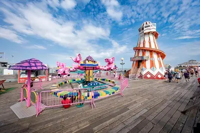 a water park on a pier with a lighthouse at Modern Caravan With Wifi At Seawick holiday park, Clacton on Sea 8 berth Large Decking in Clacton-on-Sea