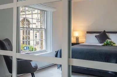 a bedroom with a bed and a window at Crown Street 4 in Bury Saint Edmunds