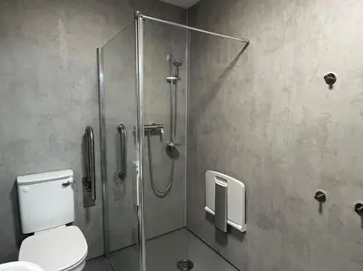 a bathroom with a shower stall with a toilet at Seahorse Studio, Aldeburgh in Aldeburgh