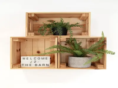 a shelf with two potted plants and a welcome to the barn sign at Pass the Keys 19th Century Barn with Free Parking in Histon