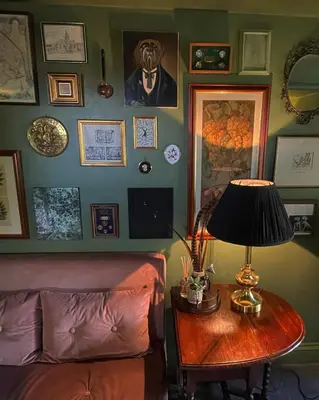 a room with a table with a lamp and a couch at Hidden gem in heart of Breckland in Watton