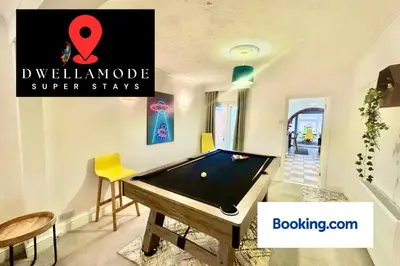 a living room with a pool table in it at 6 Bedroom House - DISC0UNTS - Pool Table, Parking, Contractors, Group, Family in Colchester