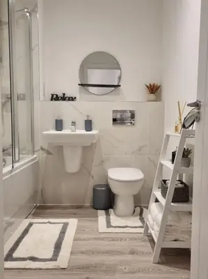 a bathroom with a toilet and a sink at Modern 2bedroom House in Ipswich Suffolk in Ipswich