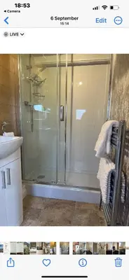 a bathroom with a shower and a sink at Kings head Inn in Stutton