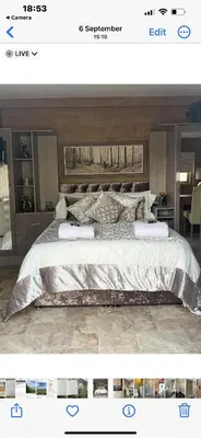 a bedroom with a large bed in a room at Kings head Inn in Stutton