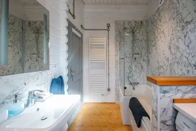 a bathroom with a sink and a tub and a shower at The Cabin, Parham in Woodbridge