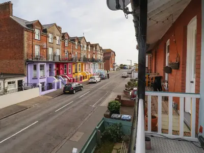 a view from a balcony of a street with houses at 11a Manning Road in Felixstowe