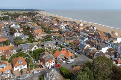 an aerial view of a town next to the beach at Pantiles in Aldeburgh