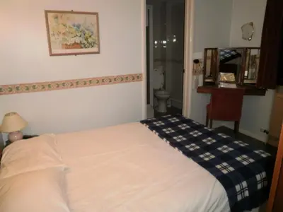 a hotel room with a bed in a room at The Prince of Wales in Huntingdon