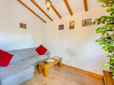 a living room with a couch and a table at Lion House- Uk45705 in Brinkley