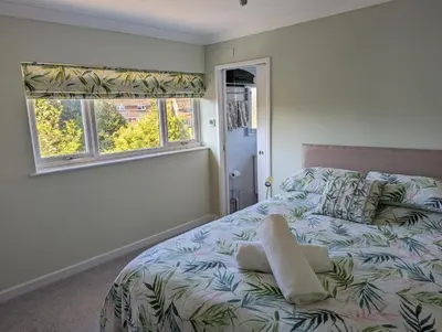 a bedroom with a bed and a window at Little Barham B&B in Wethersfield
