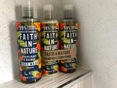a group of four bottles of faith in medicine on a shelf at Cambridge Narrowboats - Beautiful Narrowboat Glyndwr in Cambridge