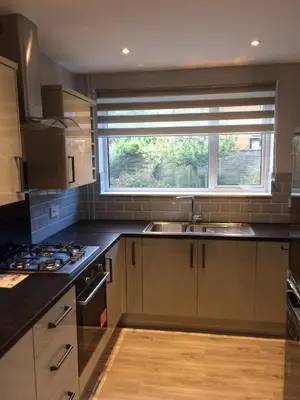 a kitchen with a sink and a window at Beautiful en-suite bedroom in Ipswich
