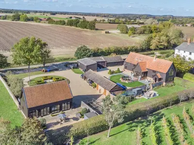 an aerial view of a house with a yard at 2 Bed in Diss oc-47778 in Hopton