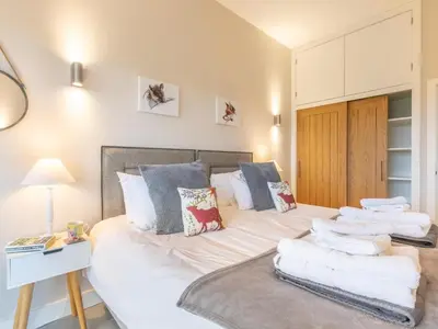 a bedroom with a bed with towels on it at 2 Bed in Diss oc-51468 in Wortham