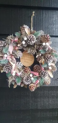a wreath on the side of a wooden door at The Granary Stradbroke in Fressingfield