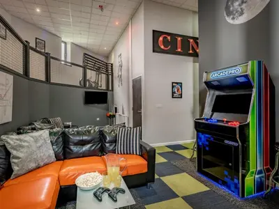 a living room with a couch and a video game console at 9 Bed in Ipswich oc-62352 in Freston
