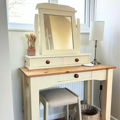 a dressing table with a mirror on top of it at Greenacre Lodge - cosy, dog-friendly rural home with private garden in Redgrave