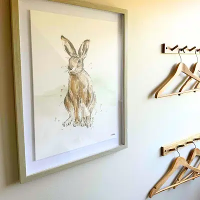 a painting of a rabbit on a wall at Greenacre Lodge - cosy, dog-friendly rural home with private garden in Redgrave