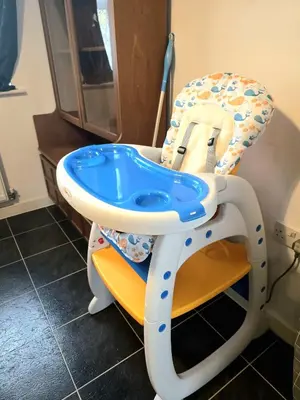 a high chair in a bathroom with a sink at Ocean-homestay in Colchester