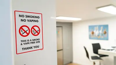 a no smoking sign on a wall in an office at Exquisite 1-bedroom apartment with on-site parking in Braintree